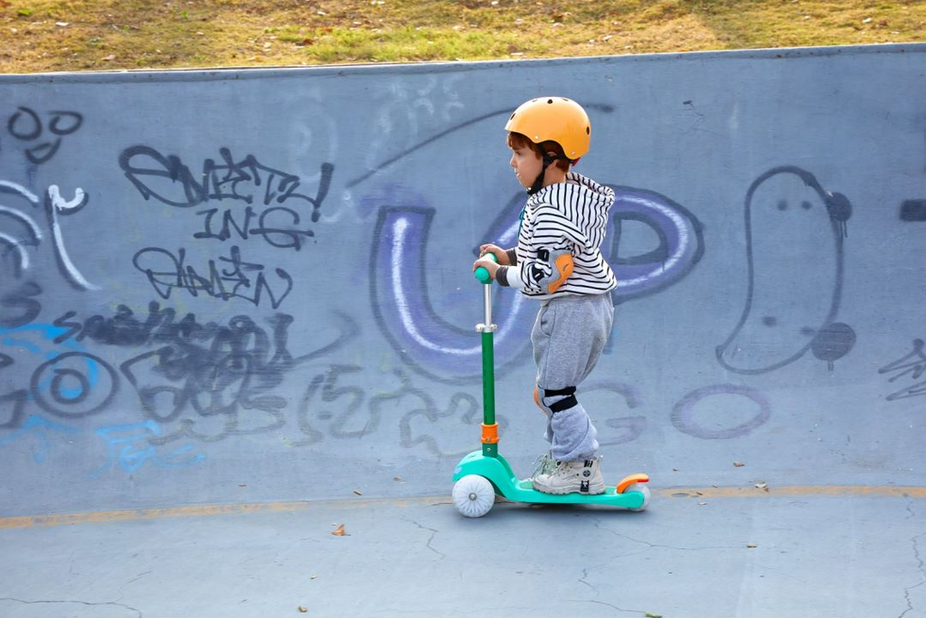 Is a kick scooter easier than a bike for kids?